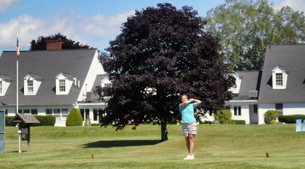 Elissa Emmons tees off at the Augusta Country Club in Manchester on July 11.