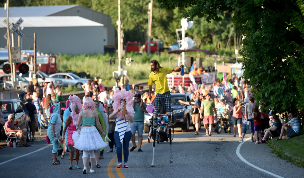 The OakFest parade makes it way up Main Street towards Church Street during OakFest in Oakland on Friday.