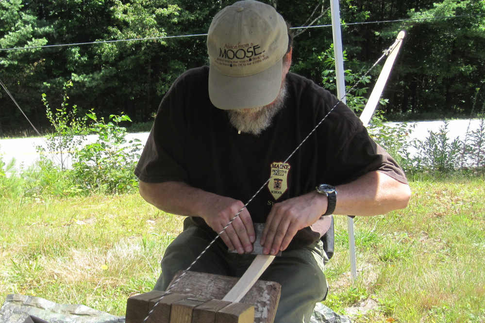 Will Sampson demonstrates how to build a bow.