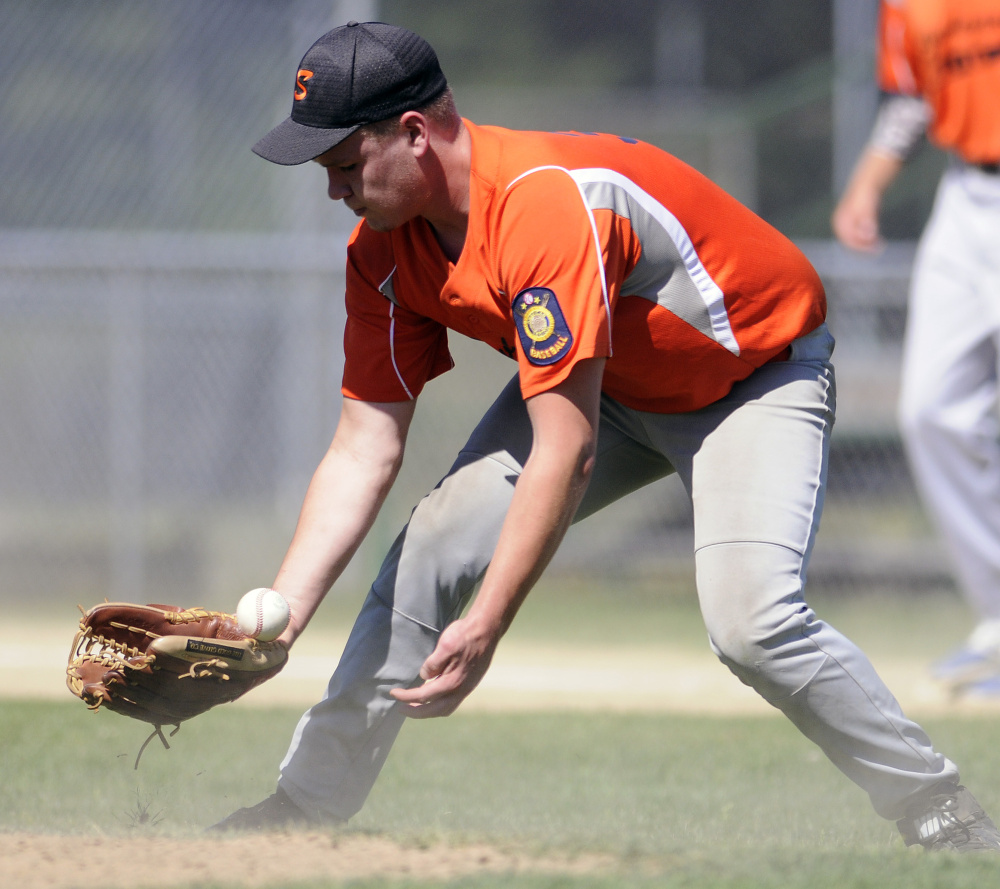 Skowhegan's Isaiah Vigue has trouble fielding the ball on the mound against Yankee Ford during the American Legion state tournament Wednesday in Augusta.