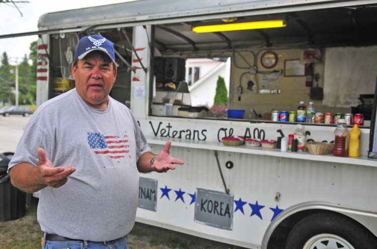 John Brennan, a Persian Gulf War veteran who helps oversee the American Legion Auxialary lunch wagon, talks about recent vandalism to the snack shack during an interview Friday on the shore of Maranacook Lake in Winthrop.