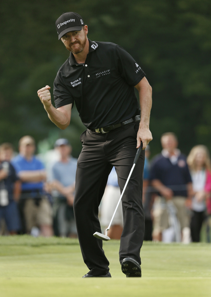 Jimmy Walker reacts to his birdie putt on the 11th hole during the final round of the PGA Championship on Sunday at Baltusrol Golf Club in Springfield, New Jersey. Walker earned a one-shot victory over Jason Day.