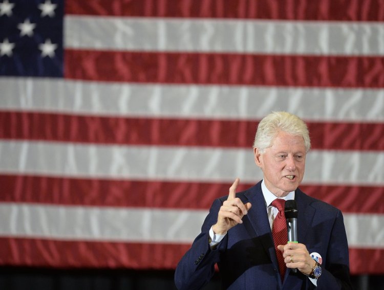 Former President Bill Clinton addresses a crowd of about 1,200 at Erie Hall at Penn State Behrend in Harborcreek Township, Pa.
