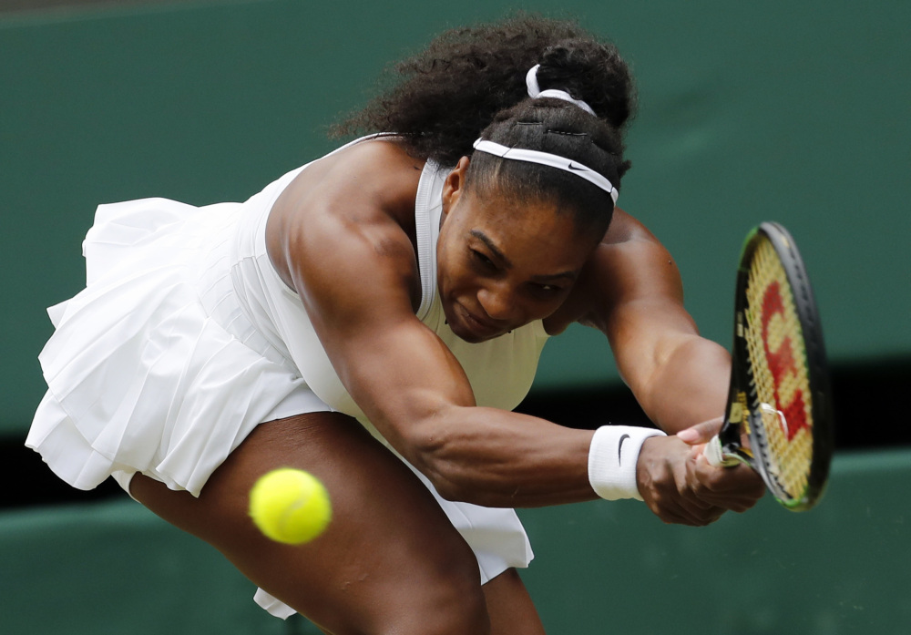 Serena Williams of the U.S returns to Christina McHale of the U.S during their women's singles match on day five of the Wimbledon Tennis Championships.