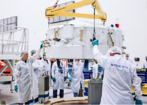 Photo shows the main payload on the SpaceX rocket that will be launched early Monday. SpaceX aims to carry another load of space station supplies for NASA, including a critical docking port needed by new U.S. crew capsules set to debut next year.