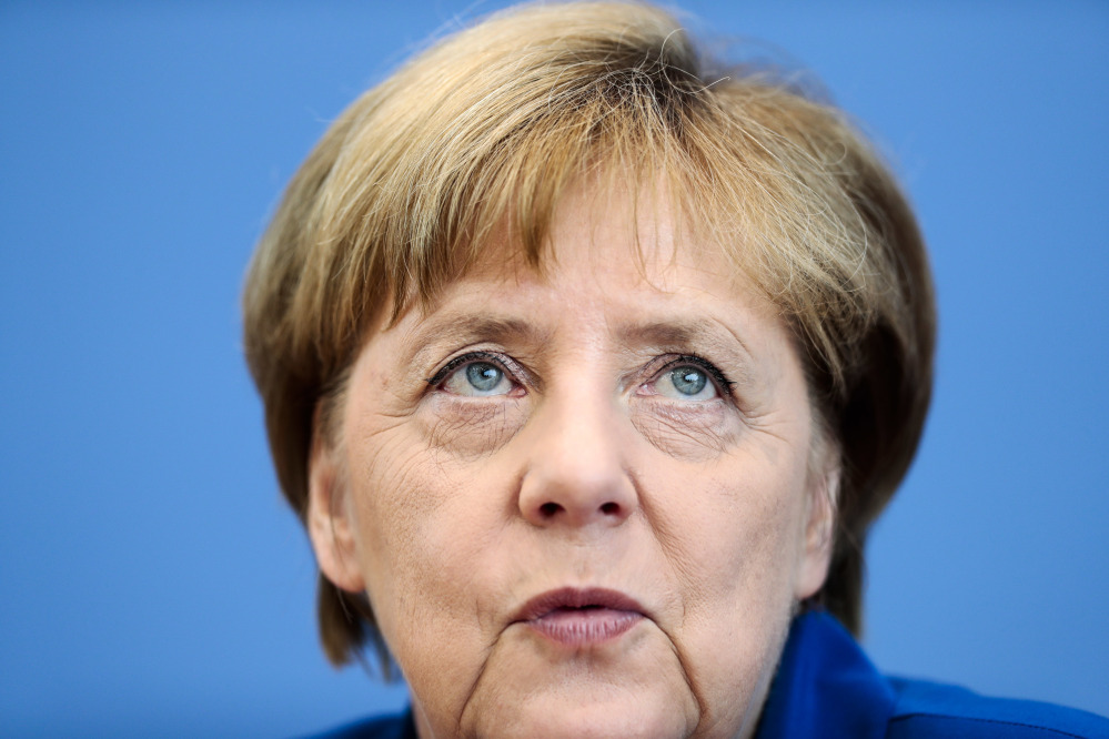 Associated Press/Markus Schreiber
German Chancellor Angela Merkel addresses the media during a news conference in Berlin Thursday.