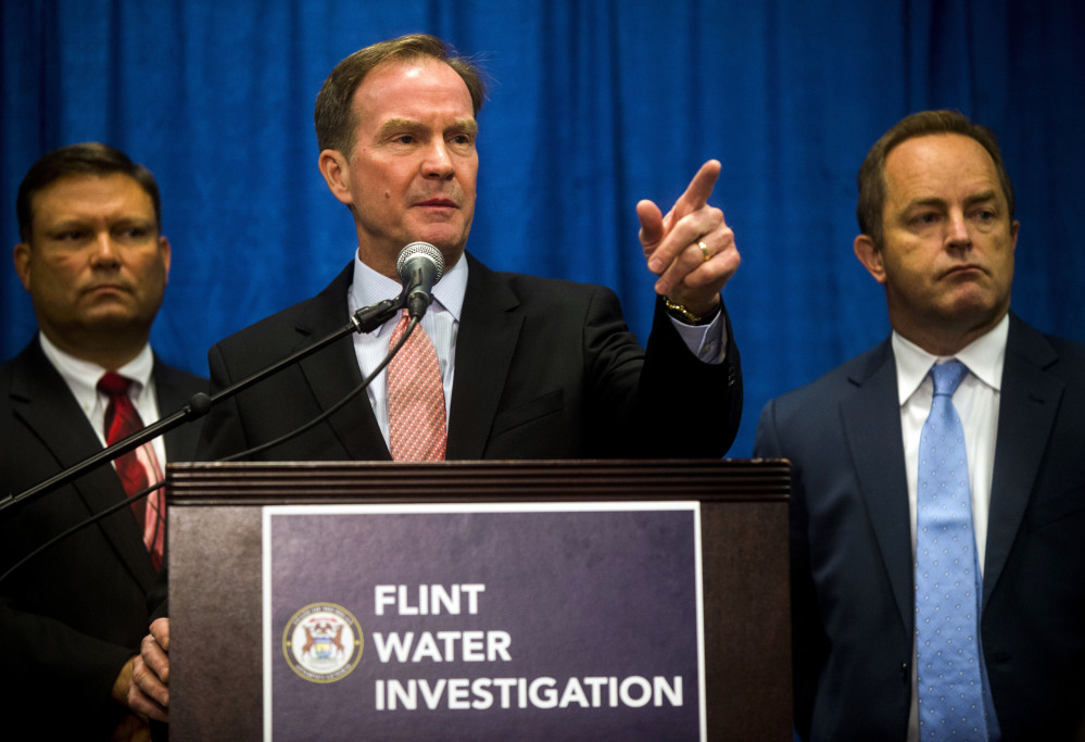 Michigan Attorney General Bill Schuette announces Friday six more state employees have been charged in connection to the Flint water crisis. A total of nine people have been charged in connection with the city's lead contamination problem.