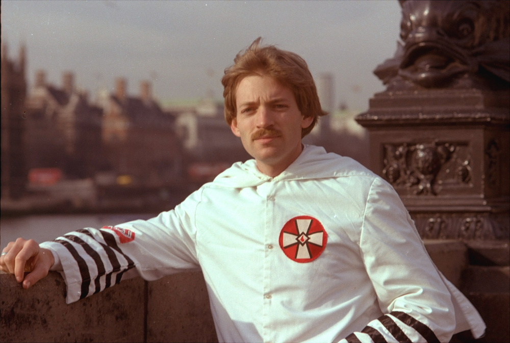 David Duke, 27-year-old Ku Klux Klan leader, poses in his Klan robes in front of the House of Parliament in London in March of 1978.  Although he was banned from entering Britain, he arrived here by way of a Skytrain flight from New York.  (AP Photo)