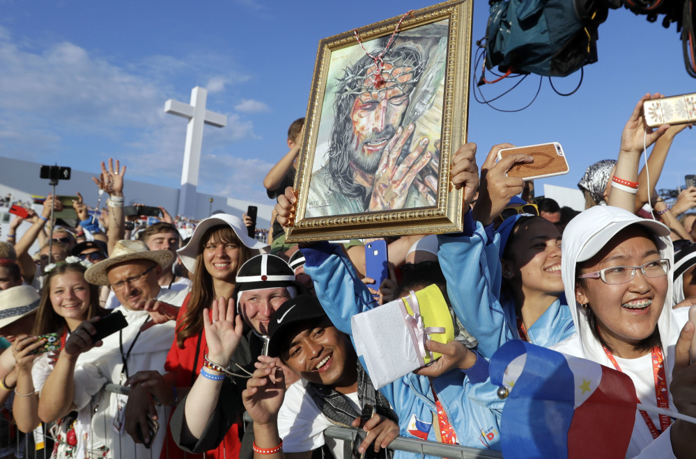 Faithful of all ages wait for Pope Francis to arrive for a prayer vigil on the occasion of the World Youth Days, in Campus Misericordiae in Brzegi Saturday.