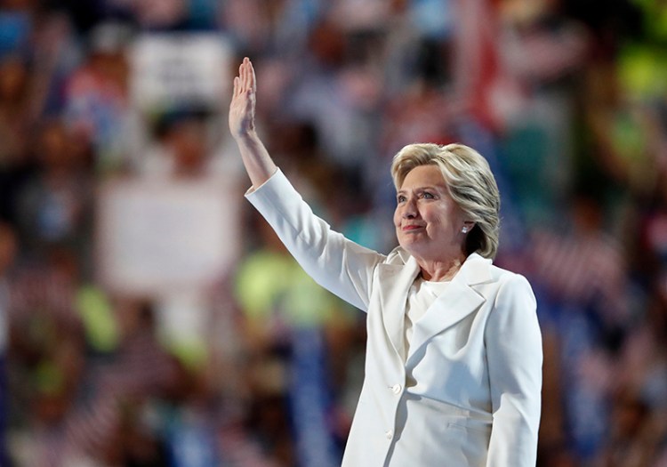 Democratic presidential nominee Hillary Clinton waves after taking the stage before her speech accepting the nomination.