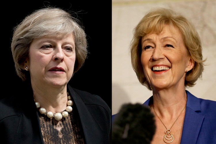 Conservative Party Members of Parliament, Home Secretary Theresa May, left, and Energy Secretary Andrea Leadsom. Leadsom says she didn't have sufficient support within the party to remain in the race for the leadership post. Associated Press