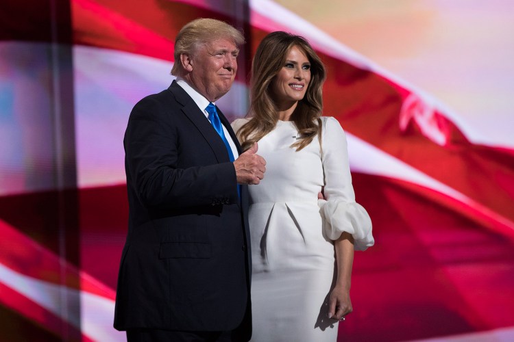 Donald Trump gives a thumbs-up after his wife, Melania, spoke during the Republican National Convention on Monday night in Cleveland. She told the crowd, "I have been aware of his love for this country since we first met."
Associated Press/Evan Vucci