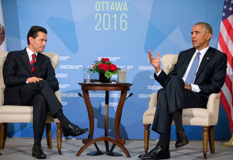 President Barack Obama and Mexican President Enrique Pena Neito talk during their bilateral meeting in Ottawa, Canada, on June 29, 2016. Pablo Martinez Monsivais/Associated Press