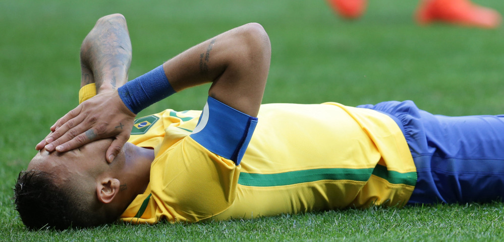 Neymar, one of the world's top young soccer players for Brazil, reacts Thursday after missing a chance during a scoreless tie with South Africa on the opening day of the men's tournament.
