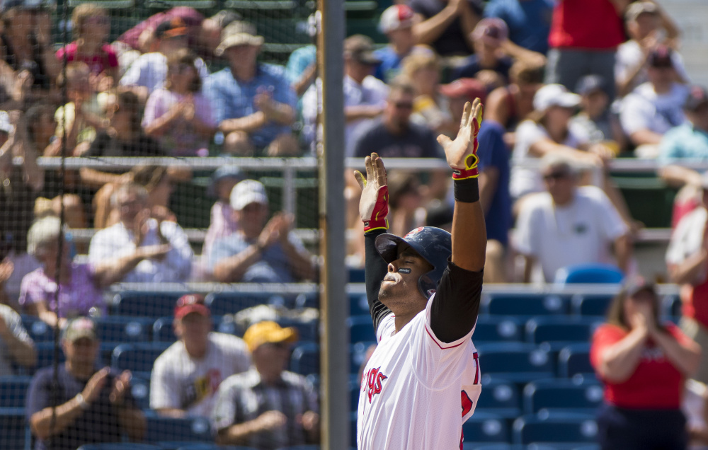Aneury Tavarez celebrates after rounding the bases following his second home run Sunday against the Akron RubberDucks. Tavarez raised his Eastern League-leading average to .330 while helping the Sea Dogs to a 5-3 win.