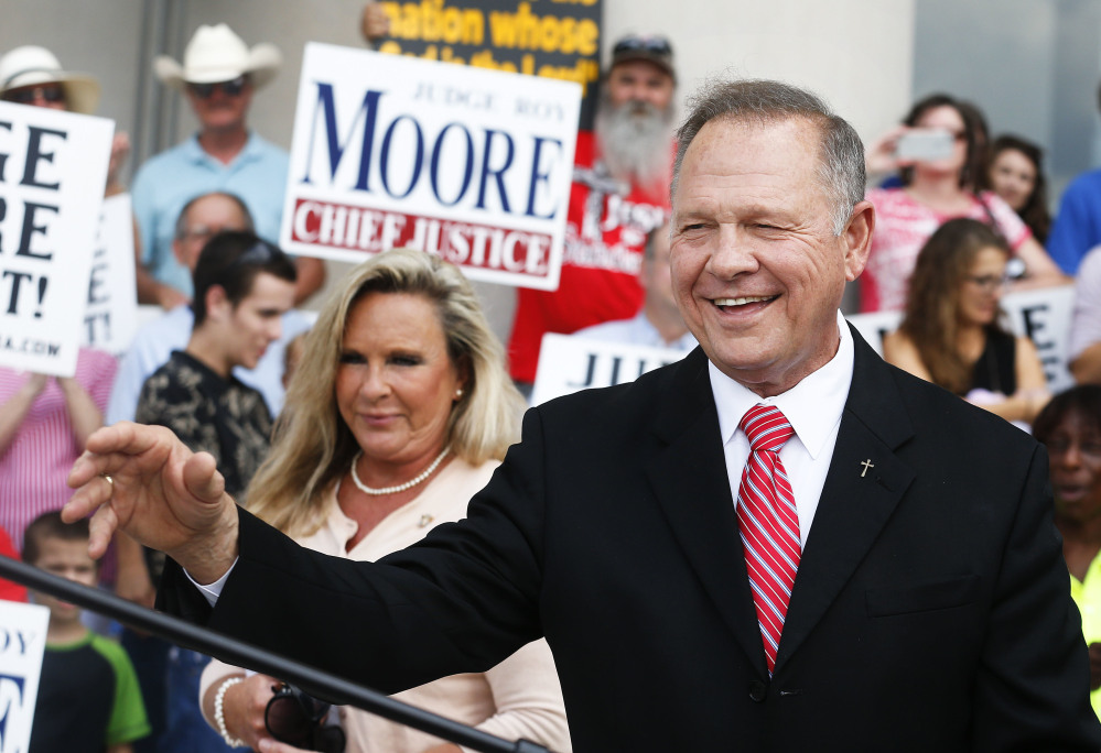 Chief Justice Roy Moore holds a news conference Monday in Montgomery, Ala. He is accused of breaking judicial ethics during the fight over same-sex marriage in the state.