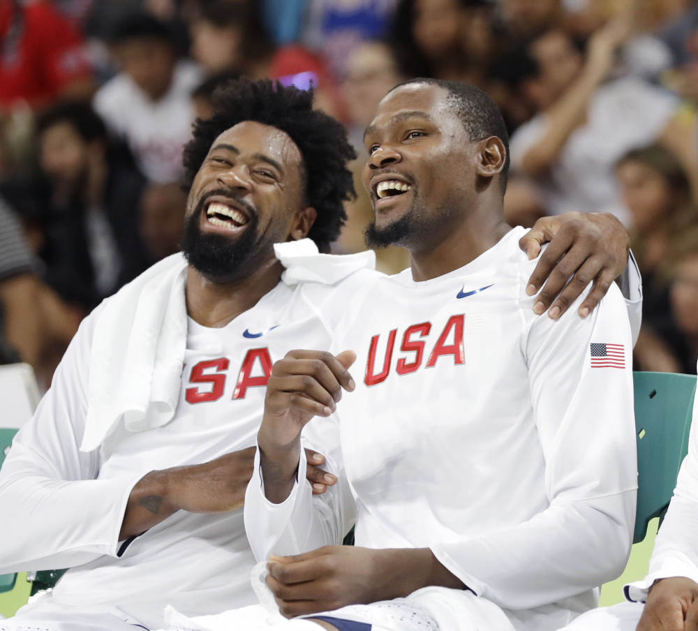 DeAndre Jordan, left, jokes with Kevin Durant, during the United States men's basketball team's 113-69 win over Venezuela on Monday in Rio de Janeiro.