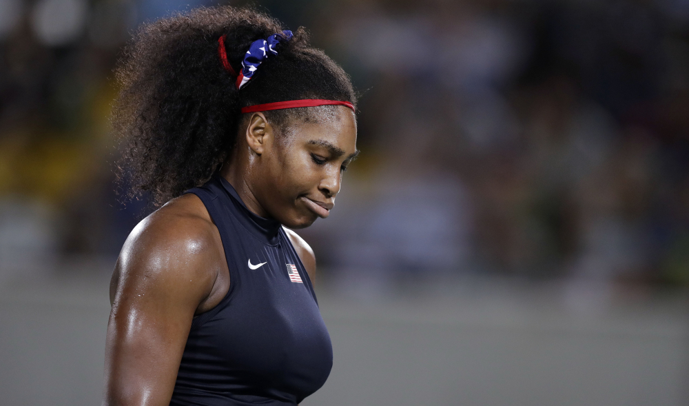 Serena Williams shows her frustration during her loss Tuesday to Elina Svitolina of Ukraine in the third round of the women's singles tennis tournament at the 2016 Summer Olympics.