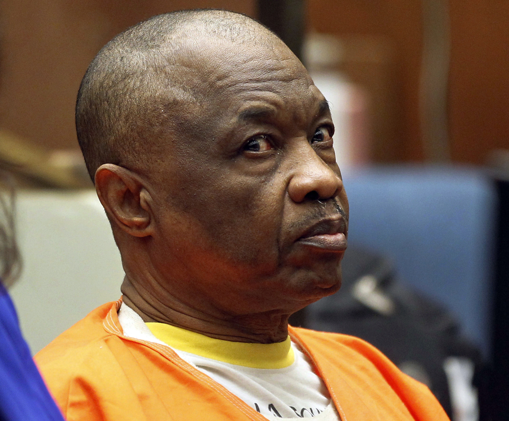 Lonnie Franklin Jr., who has been dubbed the "Grim Sleeper" serial killer, is shown during a court hearing last year. He was sentenced to death Wednesday for murdering a teenage girl and nine women.