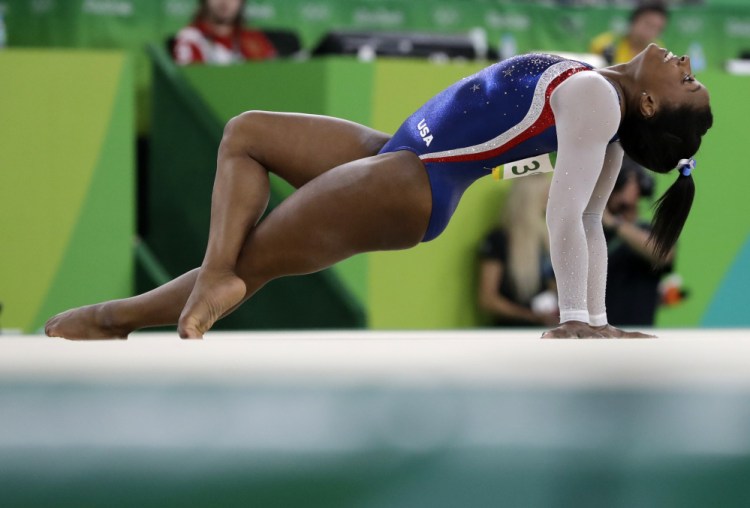 Simone Biles of the U.S. was dominant in the floor exercise Thursday, wrapping up the women's individual all-around gold medal at the Summer Olympics in Rio de Janeiro.