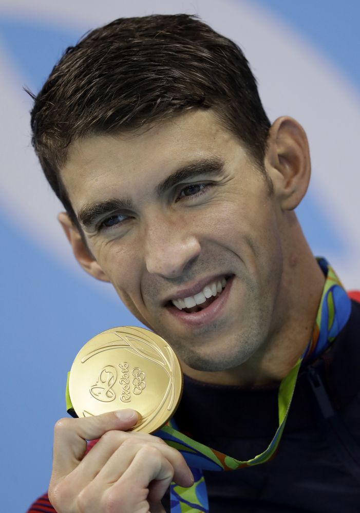 Michael Phelps insists he is retiring, but his teammate don't believe him.