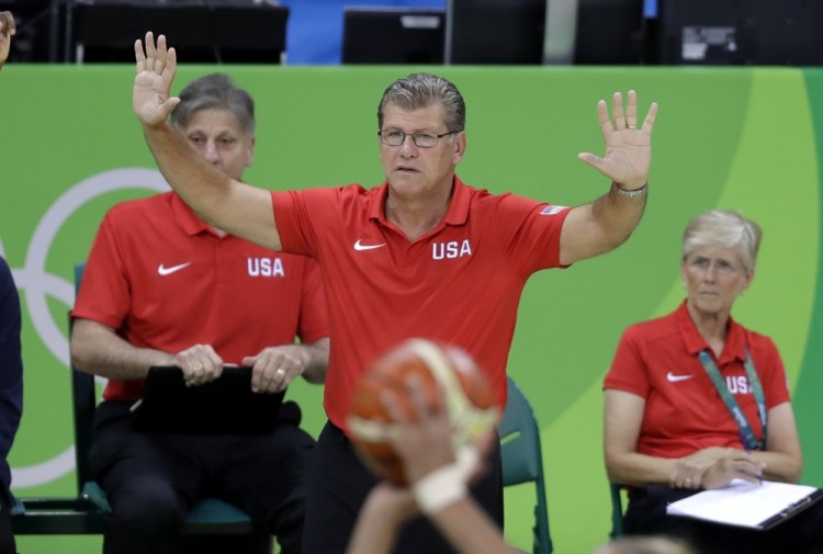 United States head coach Geno Auriemma signals from the bench during the second half of a women's basketball game against Canada at the Youth Center at the 2016 Summer Olympics in Rio de Janeiro.