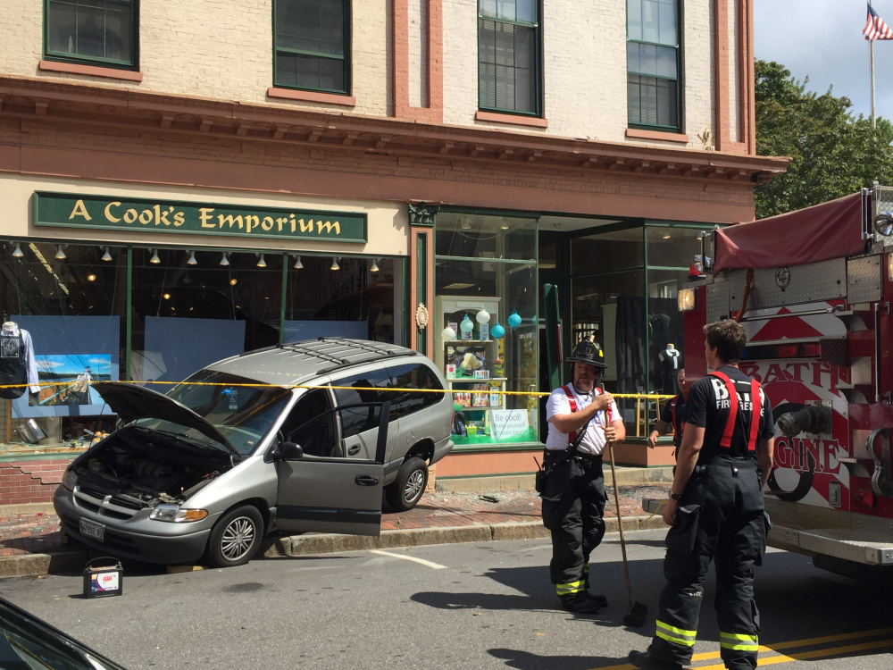 Police say an elderly man was trying to parallel park when he hit the gas pedal and backed into a store in Bath on Saturday.