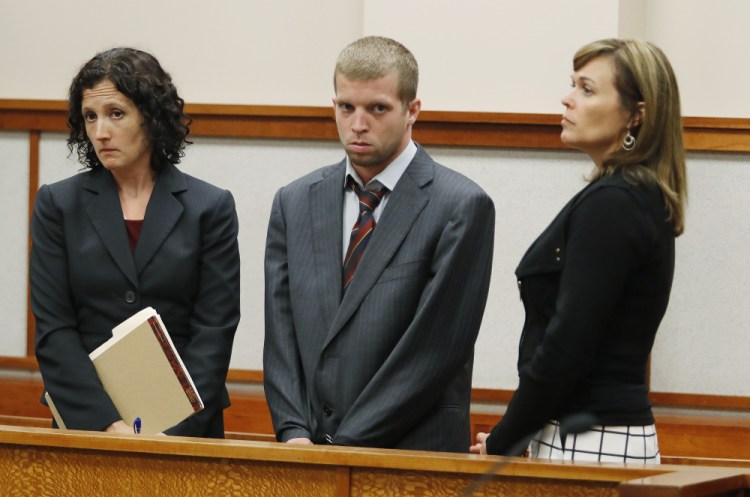 Kenneth Briggs Jr. – joined by attorneys Molly Butler Bailey, left, and Heather Gonzales – appears in court for a hearing Monday at the Cumberland County Courthouse in Portland.