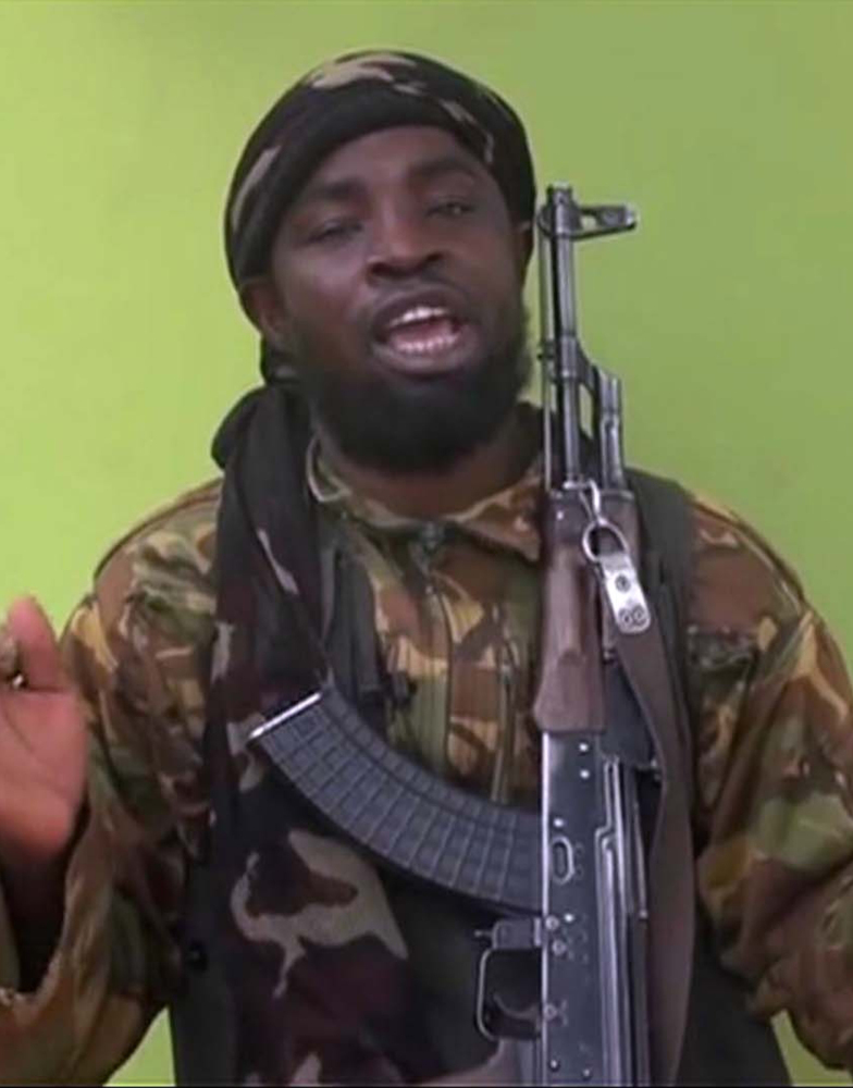 Abubakar Shekau appears in a 2014 video by Nigeria's Boko Haram terrorist network.