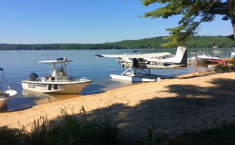 Craft lined up on Long Lake  on Thursday morning as the search resumes for the missing boater.