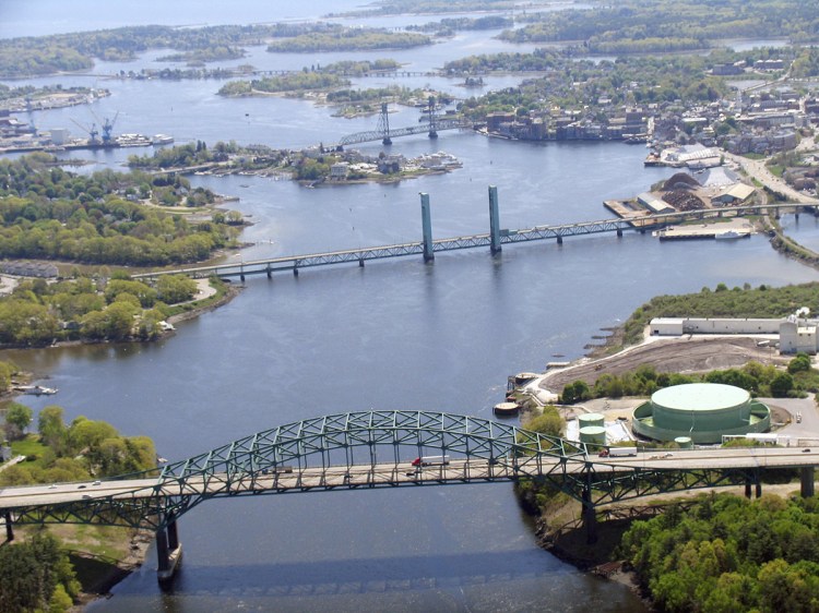 The Sarah Mildred Long Bridge, center, is one of three bridges that link Maine to New Hampshire over the Piscataqua River. The Interstate 95 Piscataqua River Bridge is in the foreground and Memorial Bridge is the background. 2011 photo courtesy of the Maine Department of Transportation