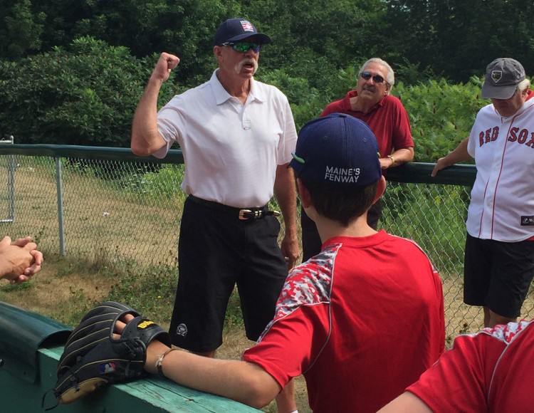 Goose Gossage talks with players during a clinic Monday at Harold Alfond Fenway Park in Oakland.