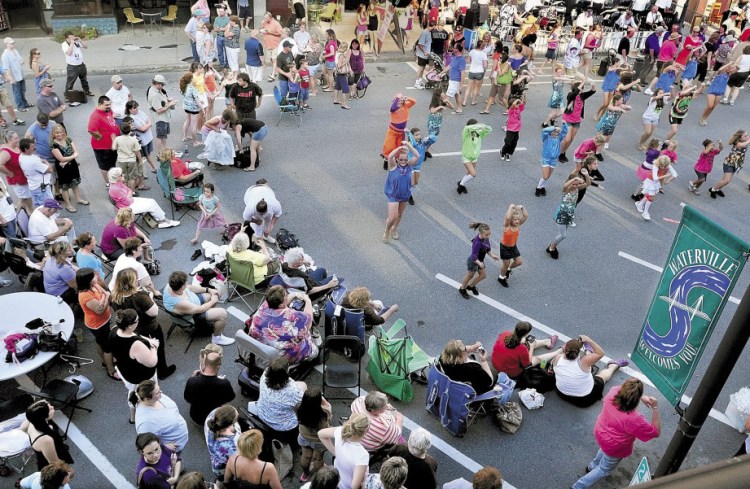 Crowds of people watch the Young American Dance Center perform on Main Street in Waterville during a Taste of Waterville event last year. This year's all-day event is scheduled for Wednesday.