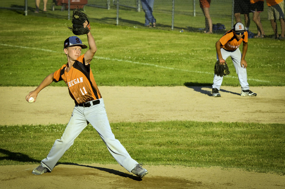 Simon Lewis manages to hold Skowhegan's lead as he takes over as relief pitcher in Tuesday's Cal Ripken 11-Under New England tournament game.