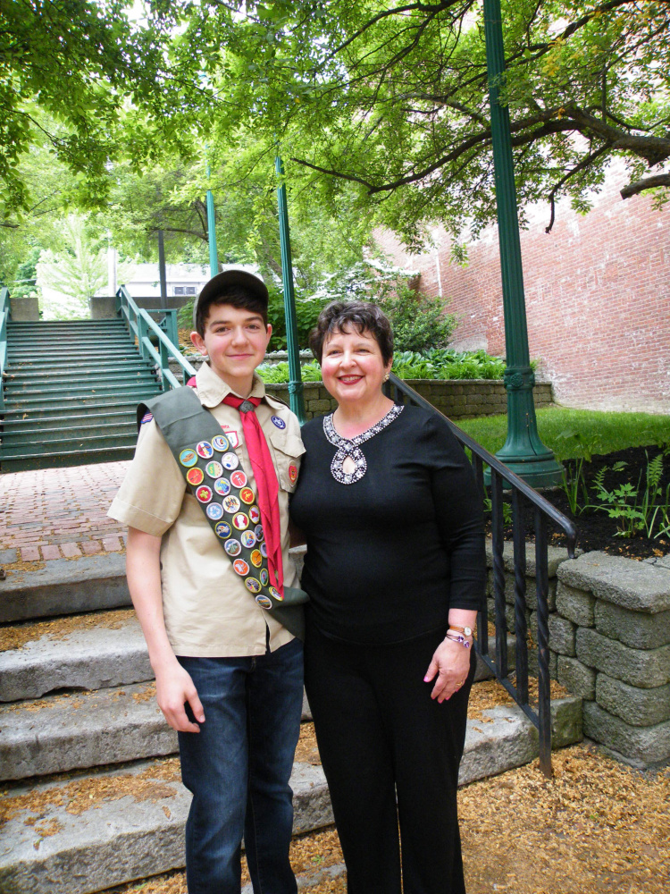 Aaron Jacob Henry Montell of Gardiner Boy Scout Troop 672, sponsored by Christ Church Episcopal, shared an Eagle Court of Honor with his cousin, Garrett Parker Brown, also of Troop 672, on June 5 in the old grand theater on the third floor of Johnson Hall in Gardiner. From left are Eagle Scout Aaron Montell with mother Susan Montell.