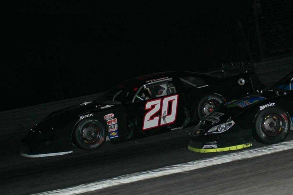 Mike Landry (20) races in the Pro All Stars Series H.P. Hood 150 on Sunday at Oxford Plains Speedway. Landry finished third for his first career top five finish in the series.