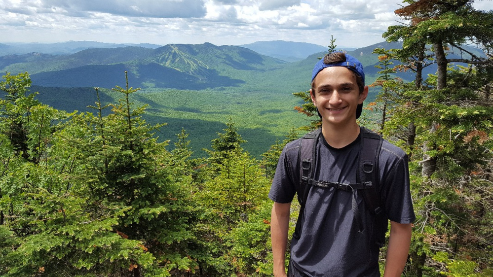 Anthony Romano, 15, of Hallowell, and his father, Jeff Romano, are hiking 271 miles to raise money for The Hearts for Ezra Foundation.
