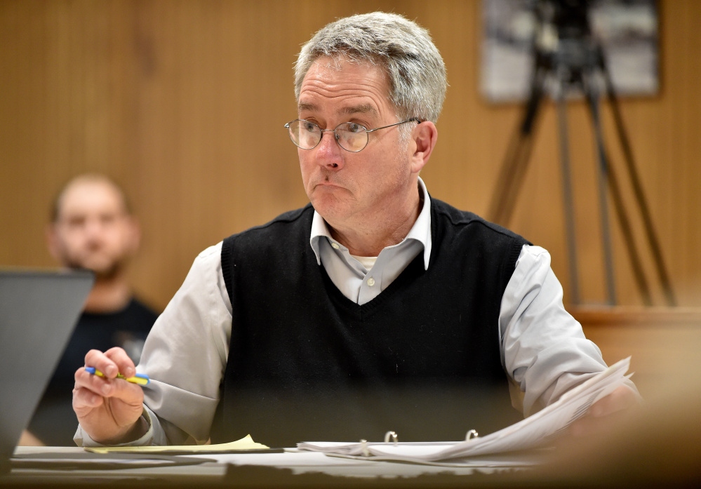 Councilor John O'Donnell listens during a review of budgets in March.