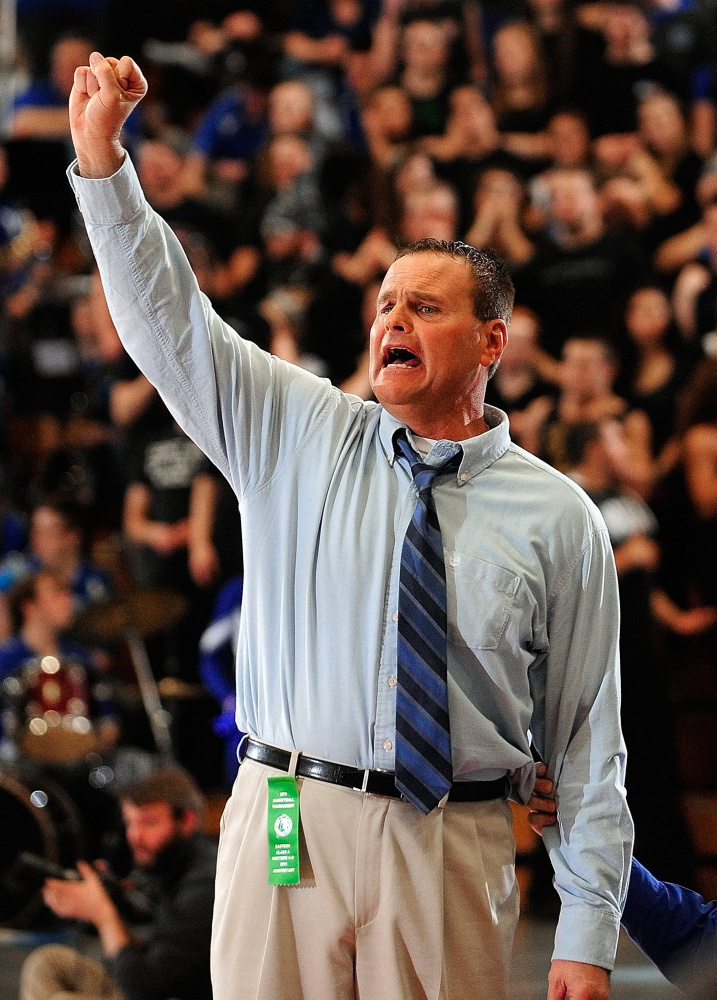 Lawrence coach Mike McGee calls instructions to his players during the Eastern A tournament championship game on Feb. 22, 2013 at the Augusta Civic Center.