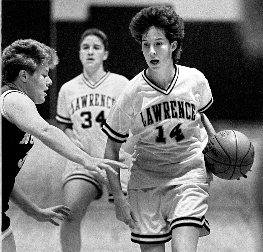 Lawrence High School standout Cindy Blodgett takes the ball up the court during a Dec. 3, 1993 game against Nokomis.