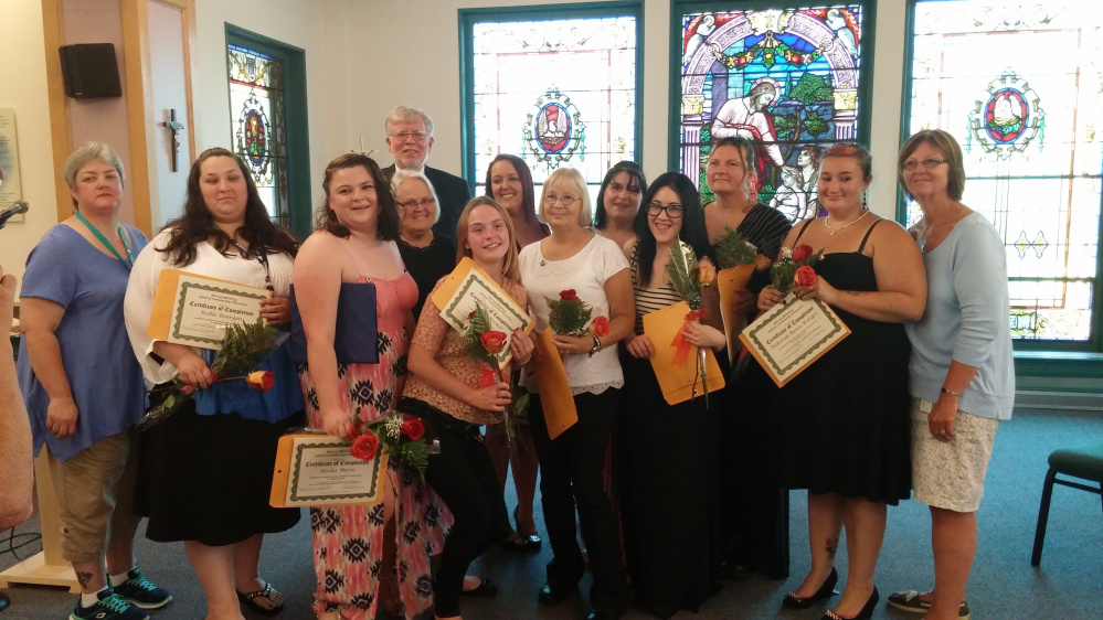 Ten local area students graduated as certified nursing aides on Aug. 3 from Mount Saint Joseph's Residence and Rehabilitation facility in Waterville. Front, from left, are Tammy Thayer, R.N.; Kellie Bourgon, Atisha Morse, Anita Dunham, Skowhegan CareerCenter manager; Collen Brewer, Diane Hatch, Halie Michaud, Deborah Rowe-Warger and Diane Sinclair. Back, from left, are Bill Laney, RSU 54 Community & Adult Education director; Ashlynn Libby and Melissa Lawler. Laura Moshier unavailable for photo.