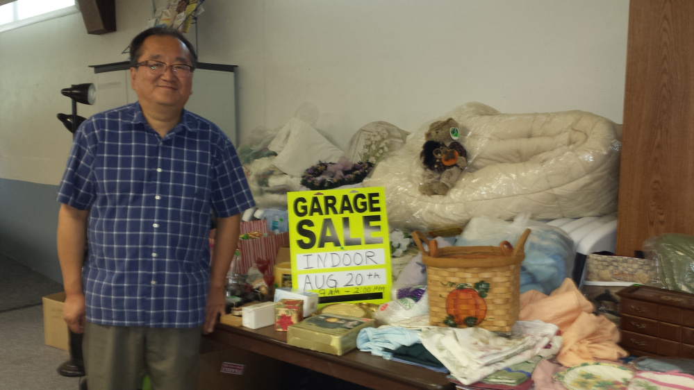 Chong Choi, pastor at Fairfield United Methodist Church, has just arrived and invites everyone to come to an indoor garage sale set for Saturday, Aug. 20.