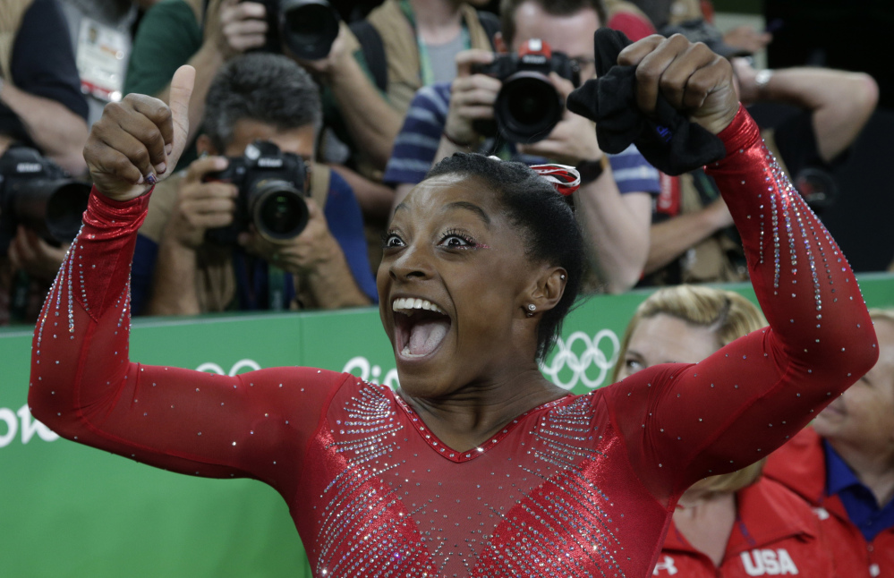 Associated Press/Rebecca Blackwell
United States' Simone Biles celebrates after her winning gold in the vault at the 2016 Summer Olympics in Rio de Janeiro on Sunday.