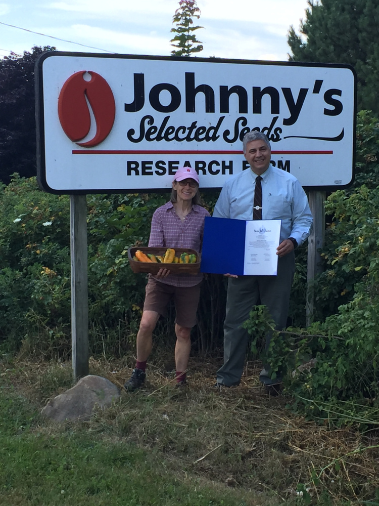 The owners and staff of Johnny's Selected Seeds in Winslow were presented a Legislative Sentiment on Aug. 3 by Sen. Scott Cyrway, R-Benton. The sentiment honored the business for having two of its pepper varieties selected as 2016 AAS Vegetable Award Winners. From left, are Janika Eckert, co-owner of Johnny's Selected Seeds, and Cryway.