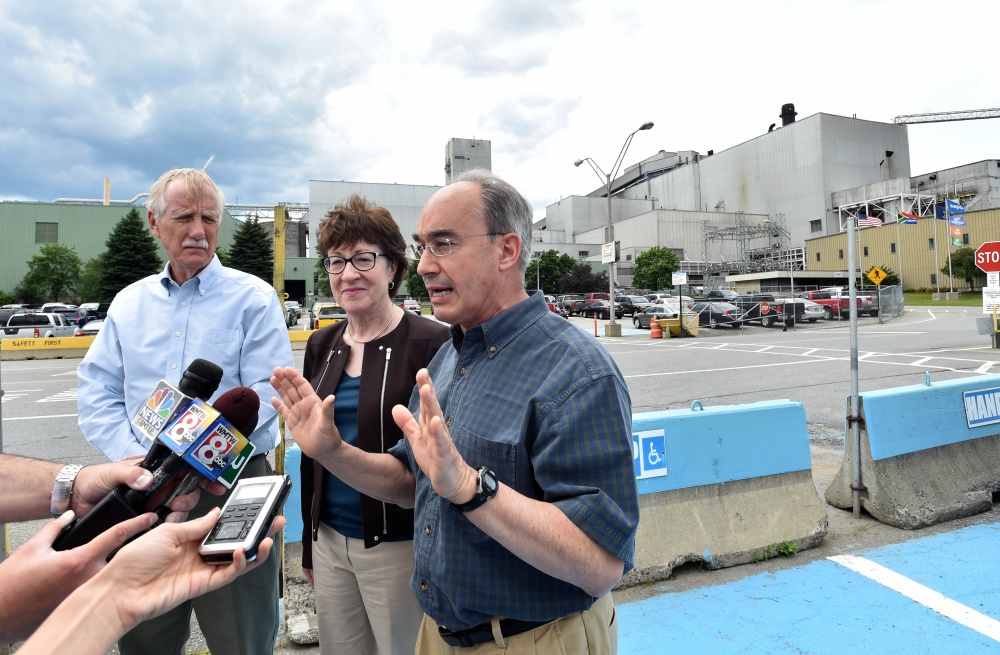 Sen. Angus King, left, Sen. Susan Collins, middle, and Rep. Bruce Poliquin, right, speak to reporters July 1 after a tour of Sappi Fine Paper in Skowhegan. The trio requested the deployment of a federal team that's in Maine this week gathering information on the challenges and assets of the state's forest products industry.