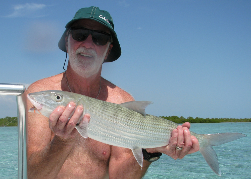 Contributed photo 
 Carroll Ware, 70, of Skowhegan, shows off a bonefish he caught off the coast of Cuba recently.