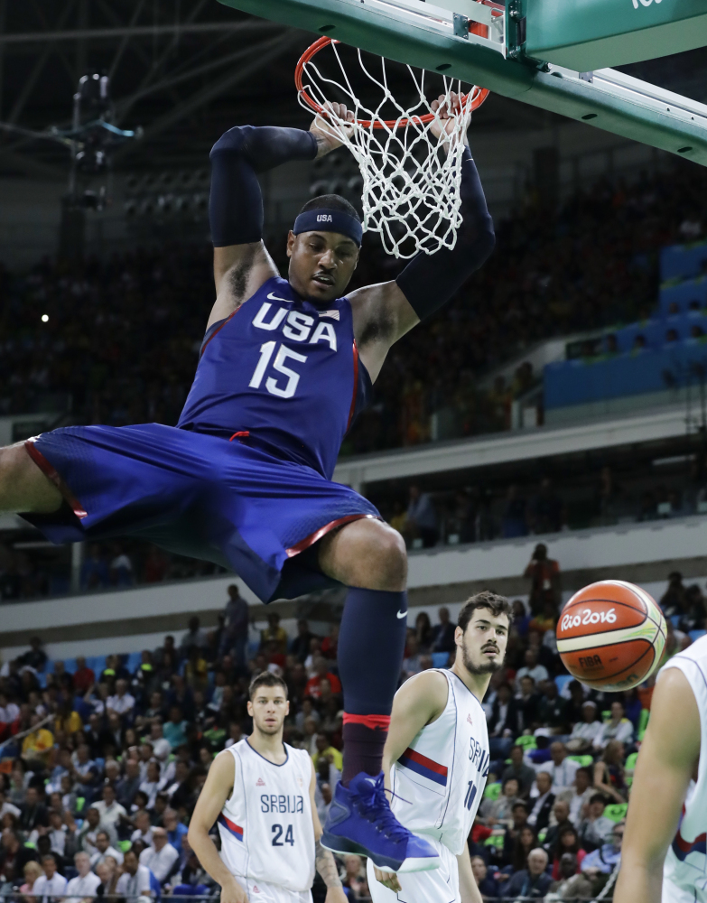 United States' Carmelo Anthony dunks against Serbia during the men's gold medal basketball game at the 2016 Summer Olympics on Sunday in Rio de Janeiro, Brazil.