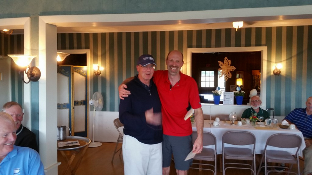 Men's Division A — 1st place winners were Jim Jannace, right,   (not shown Jeff Slinn, Mike Spear and Doug Osgood)m, with Master of Ceremony Rick Walker, left.