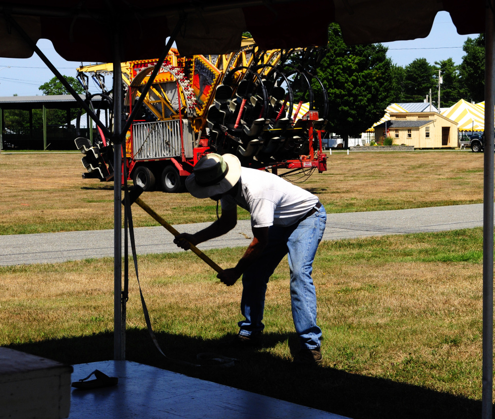 Gallery Setting up for Windsor Fair Kennebec Journal and Morning