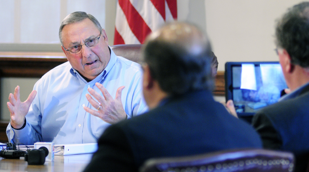 Gov. Lepage defends racial profiling and threats of violence against a lawmaker in a meeting with reporters.